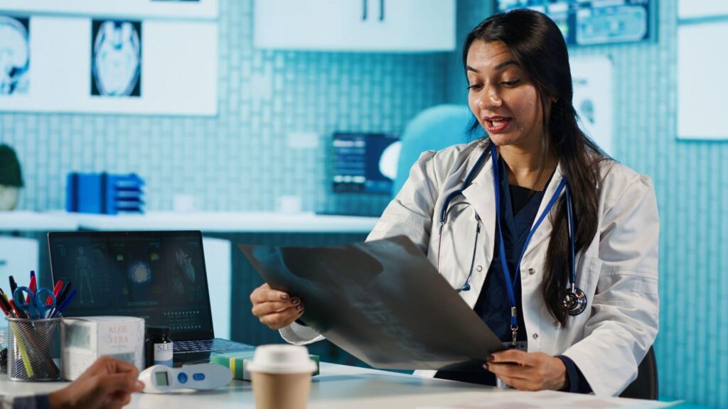 Doctor Check X Ray Report of patient
